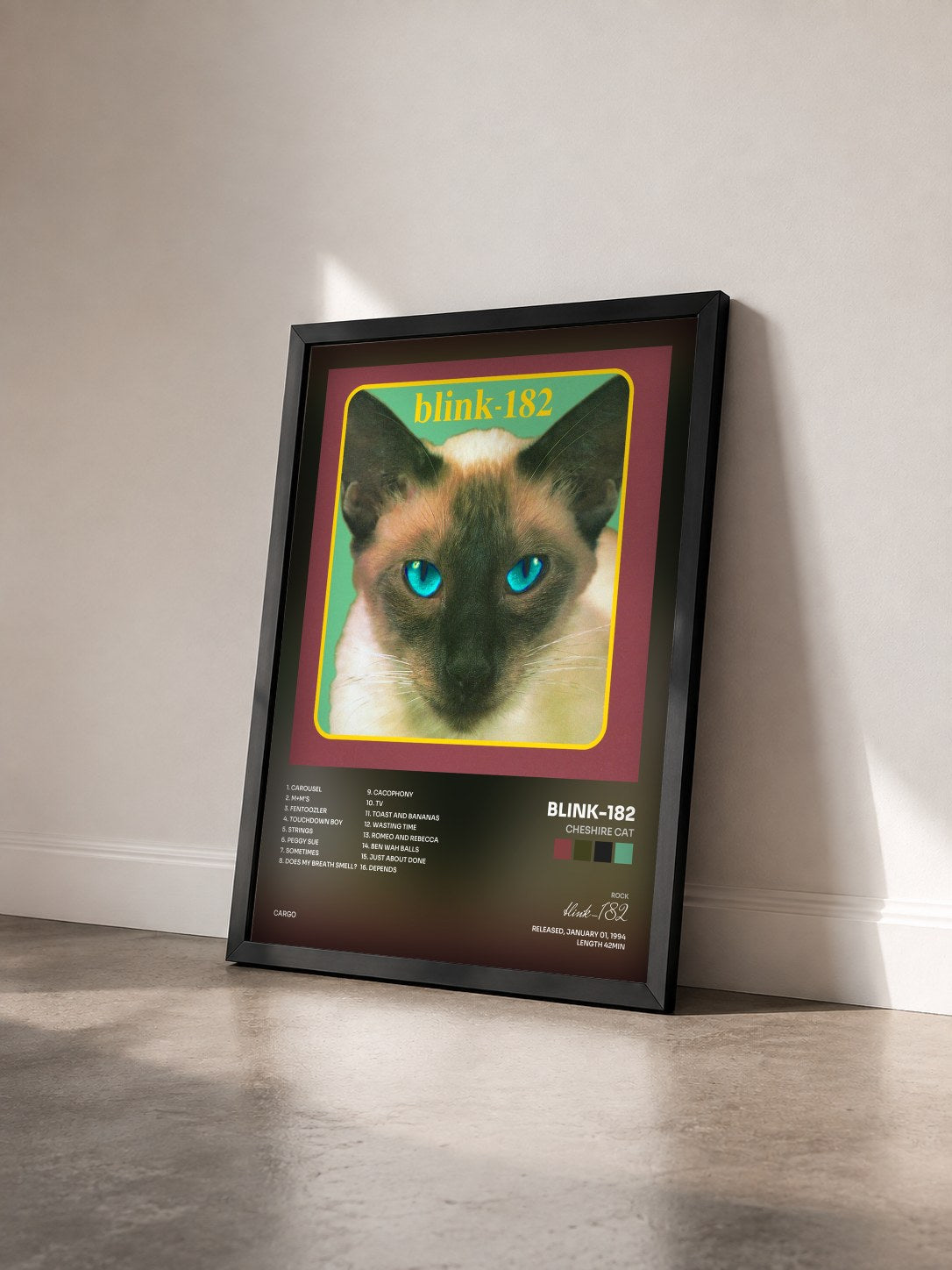 #noir Tableau de l'album Cheshire Cat de blink-182 vu de trois quarts, cadre noir