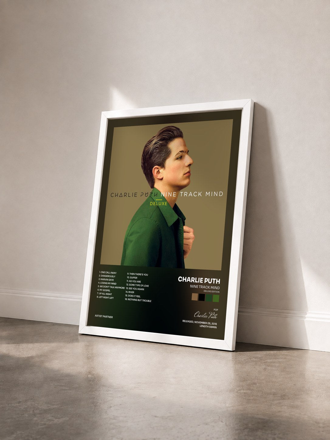 #blanc Tableau de l'album Nine Track Mind (Deluxe Edition) de Charlie Puth vu de trois quarts, cadre blanc