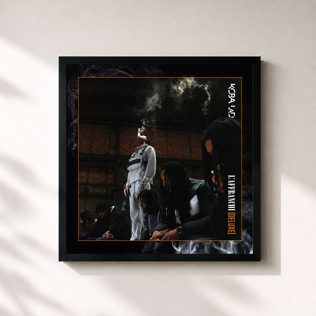 #noir Tableau carré de l'album L'Affranchi (Deluxe) de Koba LaD, cadre noir 32x32 cm