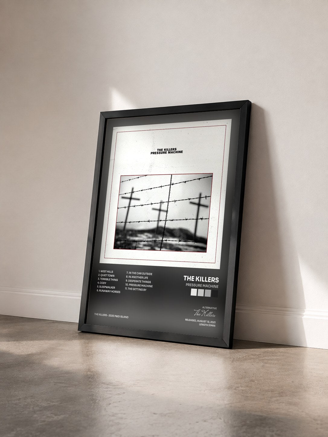 #noir Tableau de l'album Pressure Machine de The Killers vu de trois quarts, cadre noir