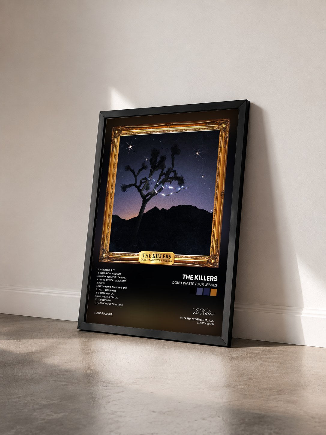 #noir Tableau de l'album Don't Waste Your Wishes de The Killers vu de trois quarts, cadre noir