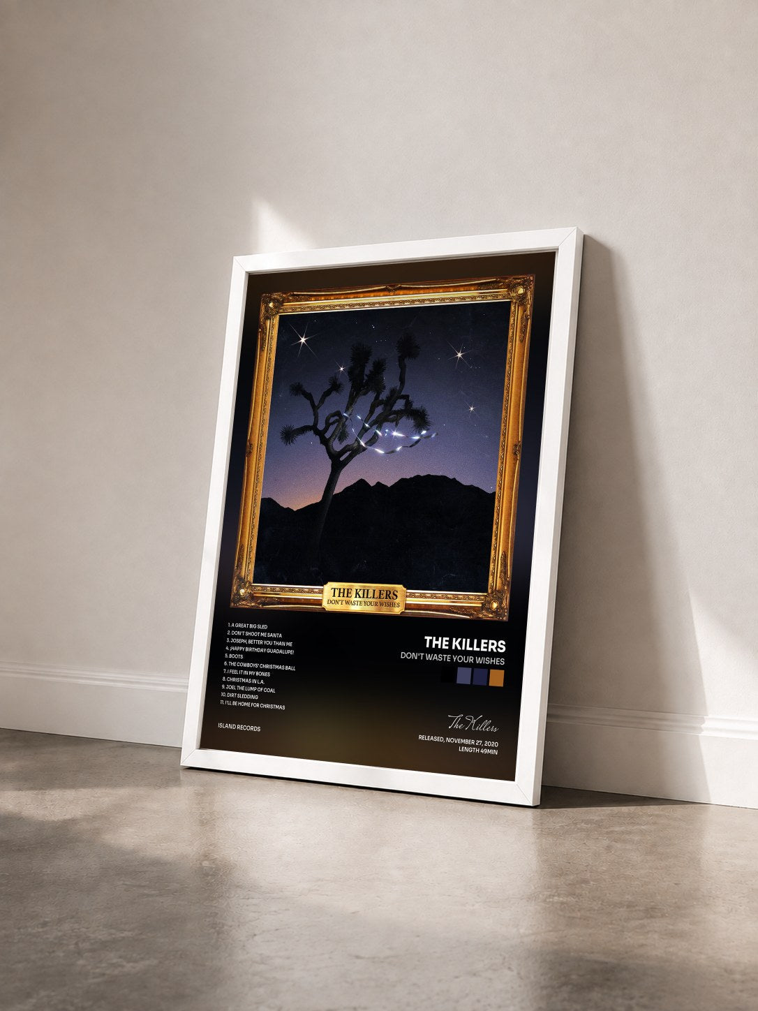 #blanc Tableau de l'album Don't Waste Your Wishes de The Killers vu de trois quarts, cadre blanc