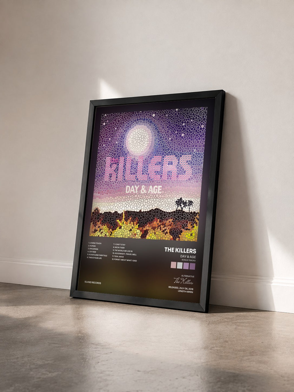 #noir Tableau de l'album Day & Age (Bonus Tracks) de The Killers vu de trois quarts, cadre noir