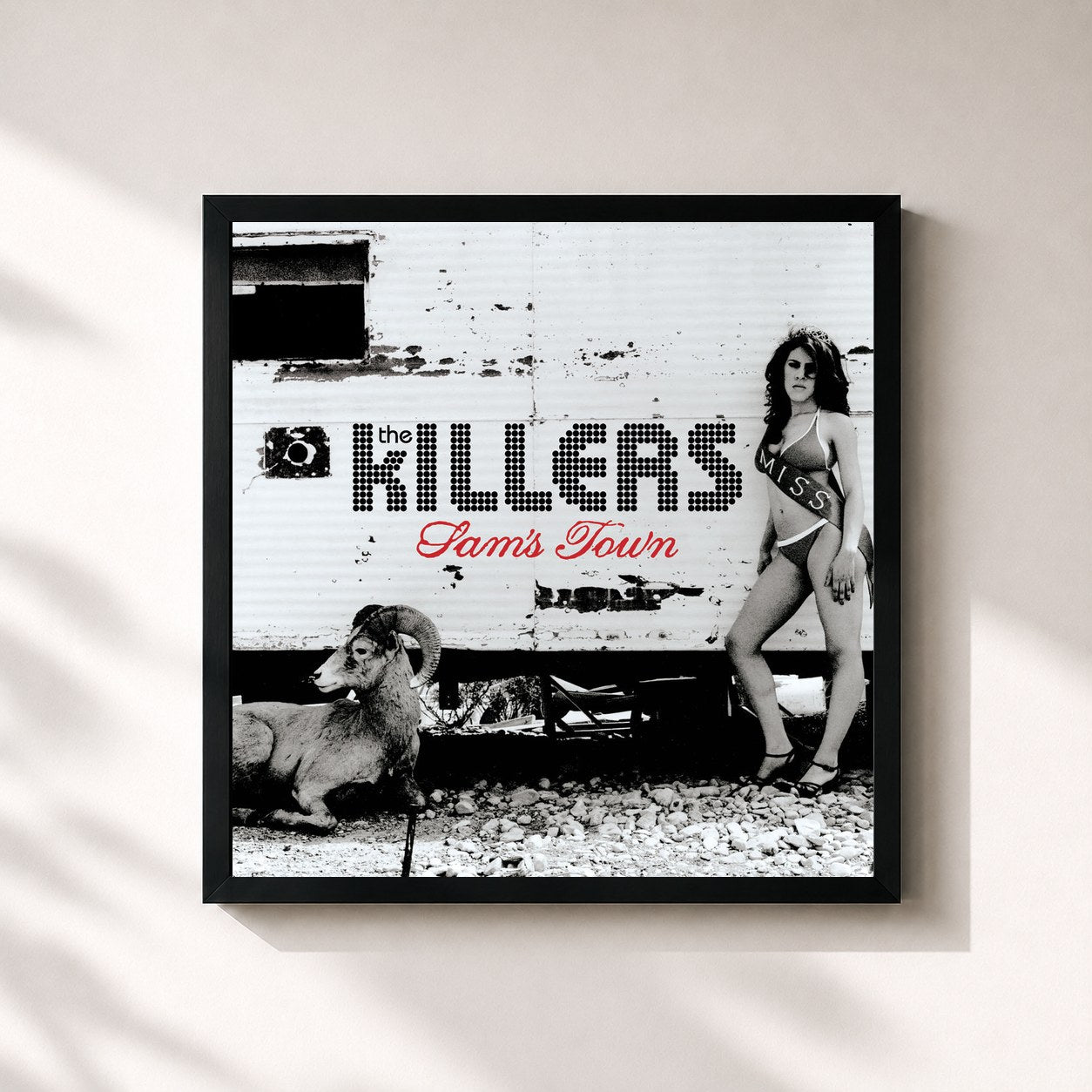 #noir Sam's Town by The Killers as a square framed art print, black 32x32 cm frame