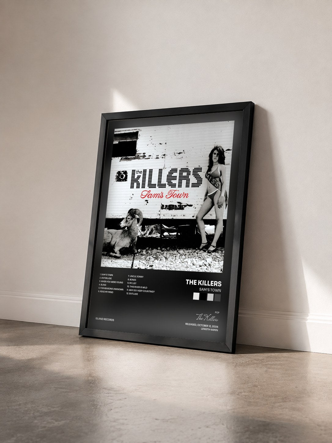 #noir Sam's Town by The Killers as a framed art print seen at an angle, black frame