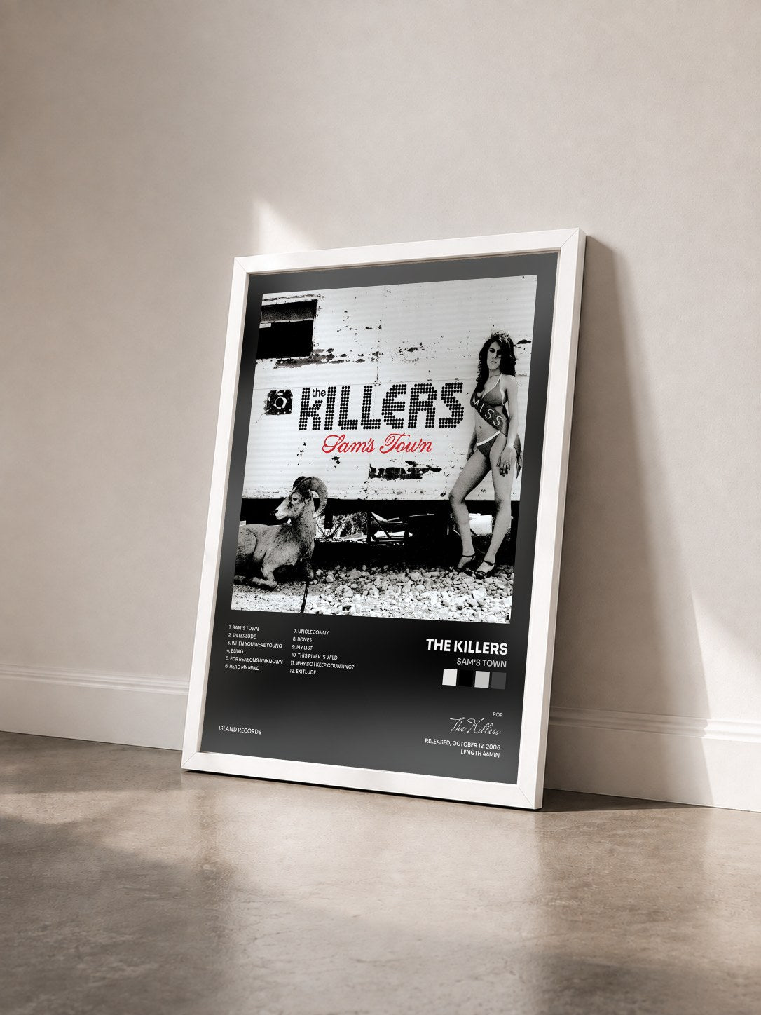 #blanc Sam's Town by The Killers as a framed art print seen at an angle, white frame