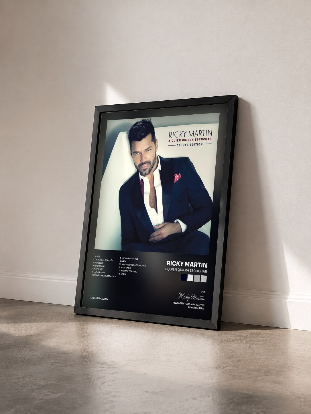 #noir A Quien Quiera Escuchar by Ricky Martin as a framed art print seen at an angle, black frame