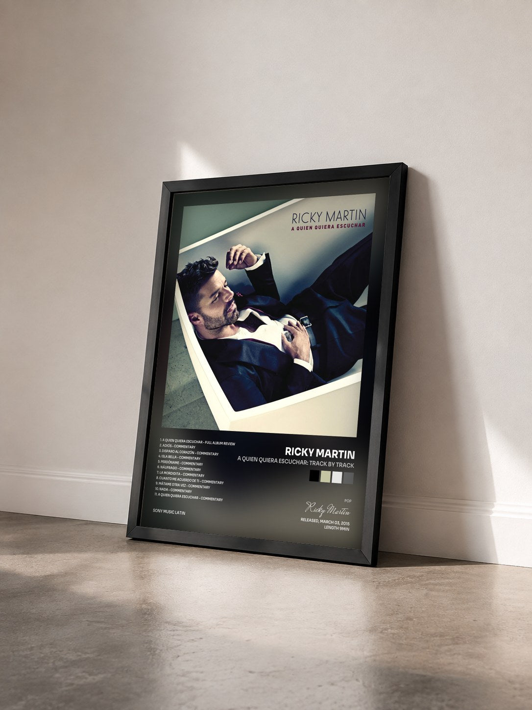 #noir A Quien Quiera Escuchar: Track by Track by Ricky Martin as a framed art print seen at an angle, black frame