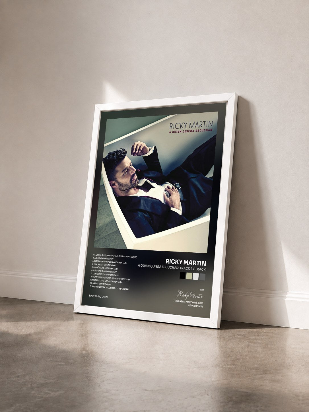#blanc A Quien Quiera Escuchar: Track by Track by Ricky Martin as a framed art print seen at an angle, white frame