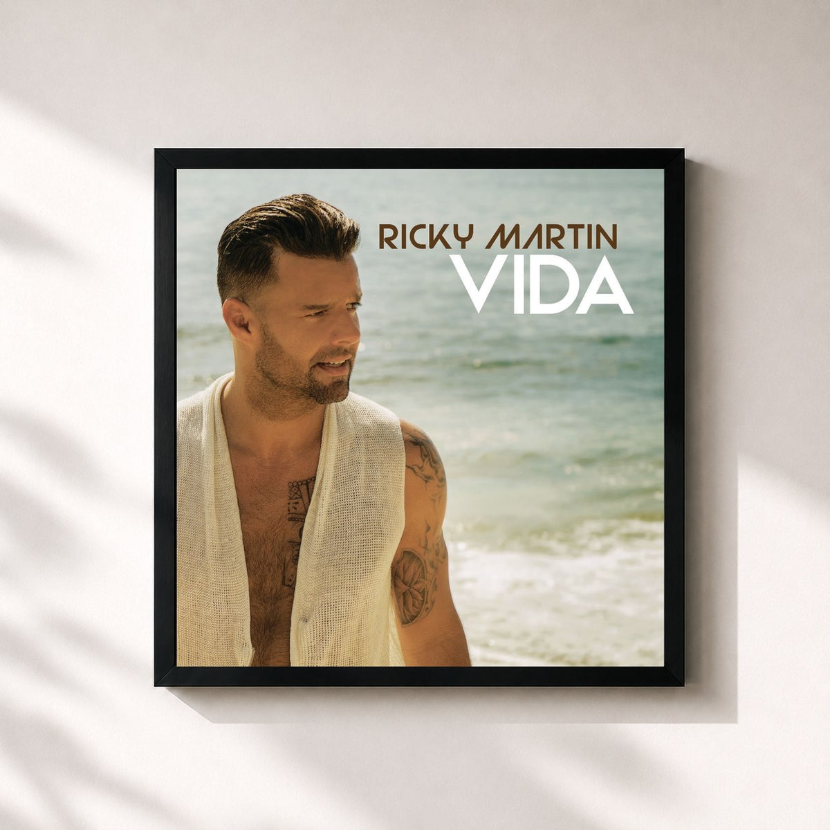 #noir Vida by Ricky Martin as a square framed art print, black 32x32 cm frame