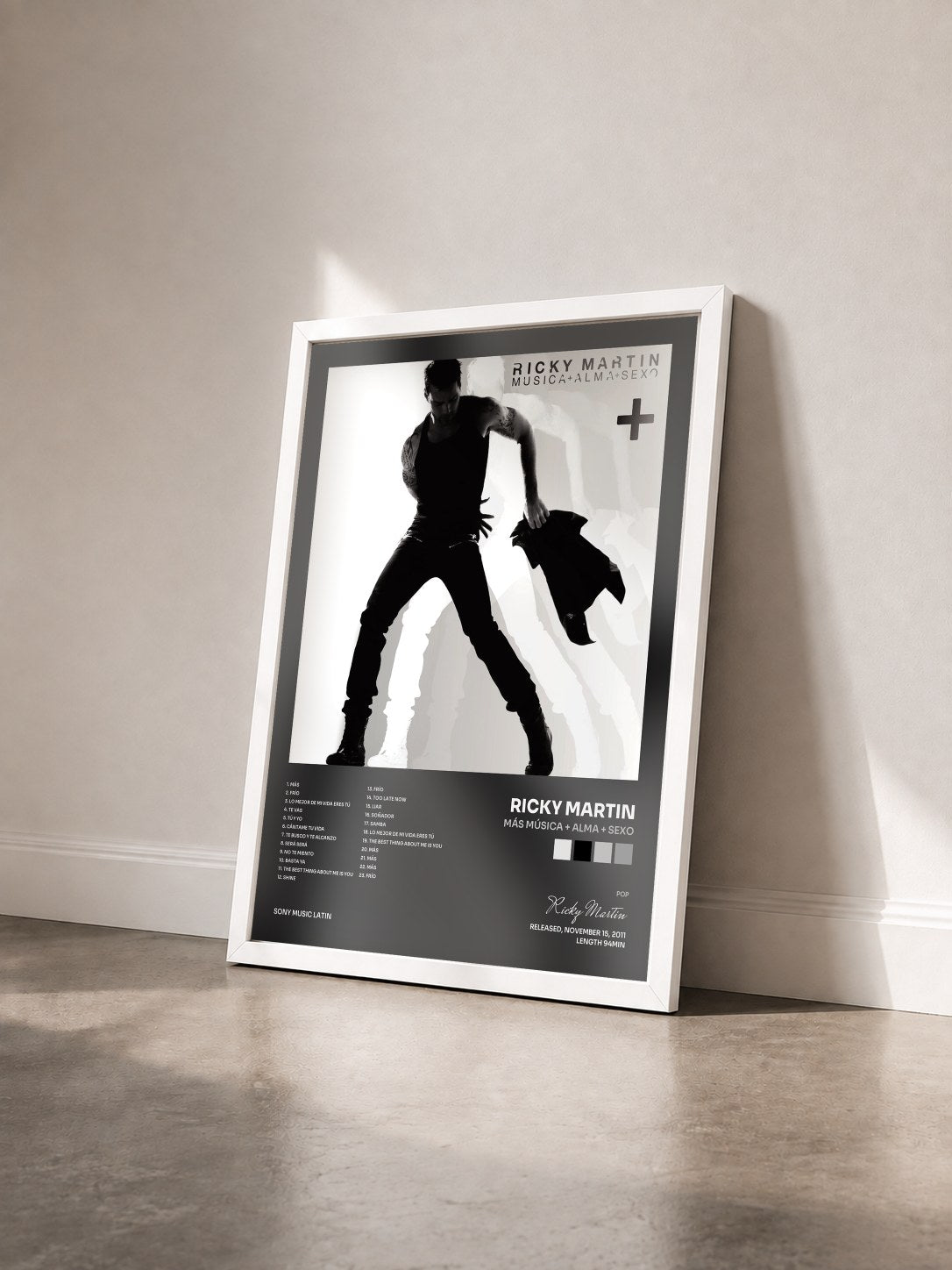 #blanc Más Música + Alma + Sexo by Ricky Martin as a framed art print seen at an angle, white frame