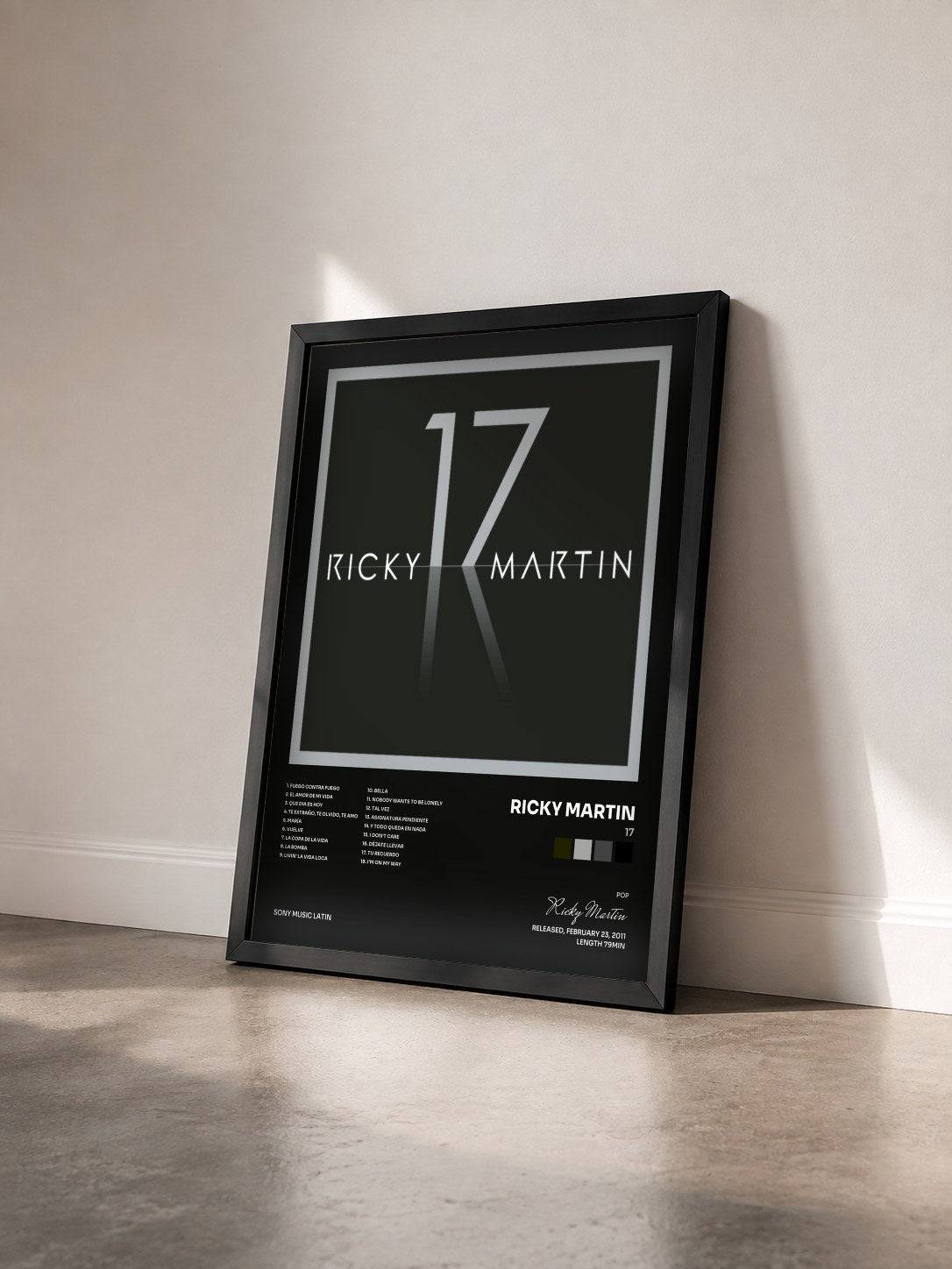 #noir 17 by Ricky Martin as a framed art print seen at an angle, black frame