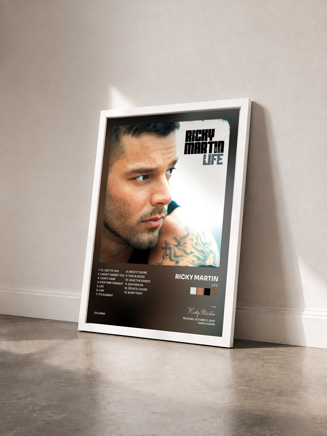 #blanc Life by Ricky Martin as a framed art print seen at an angle, white frame