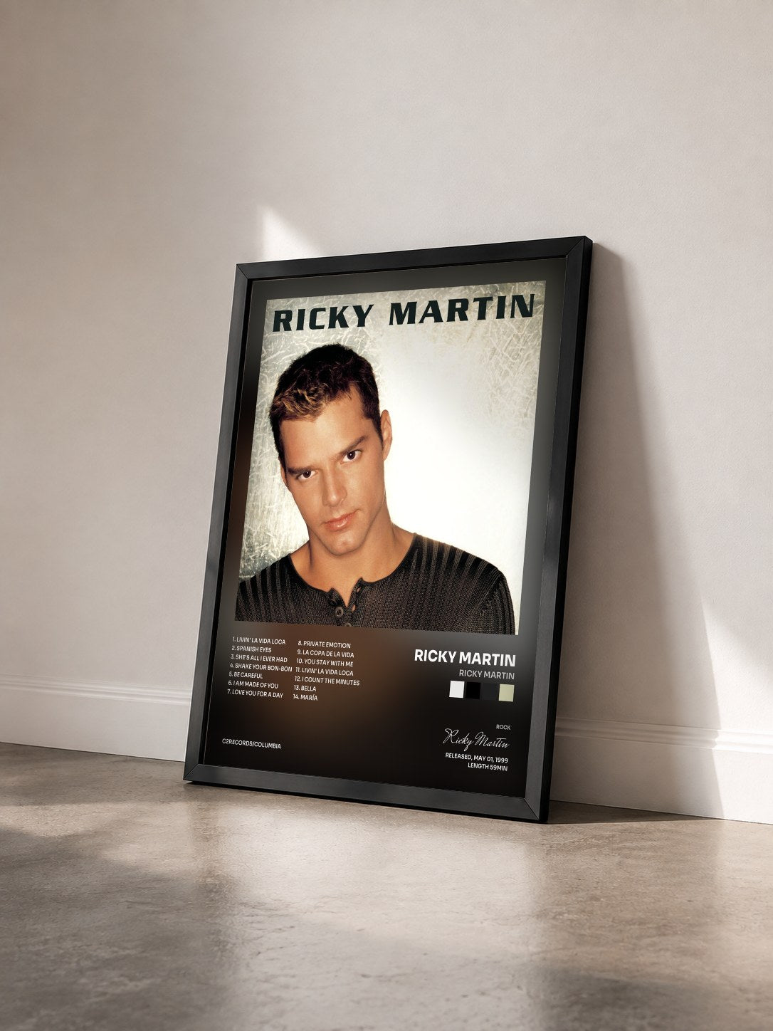 #noir Ricky Martin by Ricky Martin as a framed art print seen at an angle, black frame