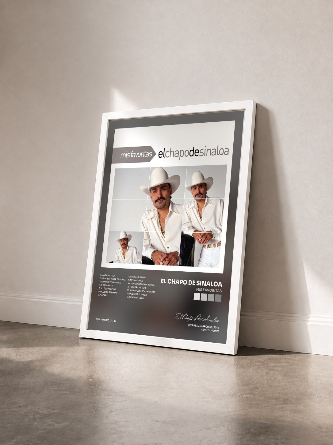 #blanc Tableau de l'album Mis Favoritas de El Chapo De Sinaloa vu de trois quarts, cadre blanc