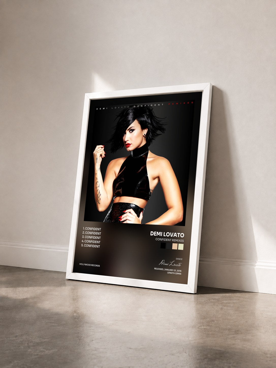 #blanc Tableau de l'album Confident Remixes de Demi Lovato vu de trois quarts, cadre blanc