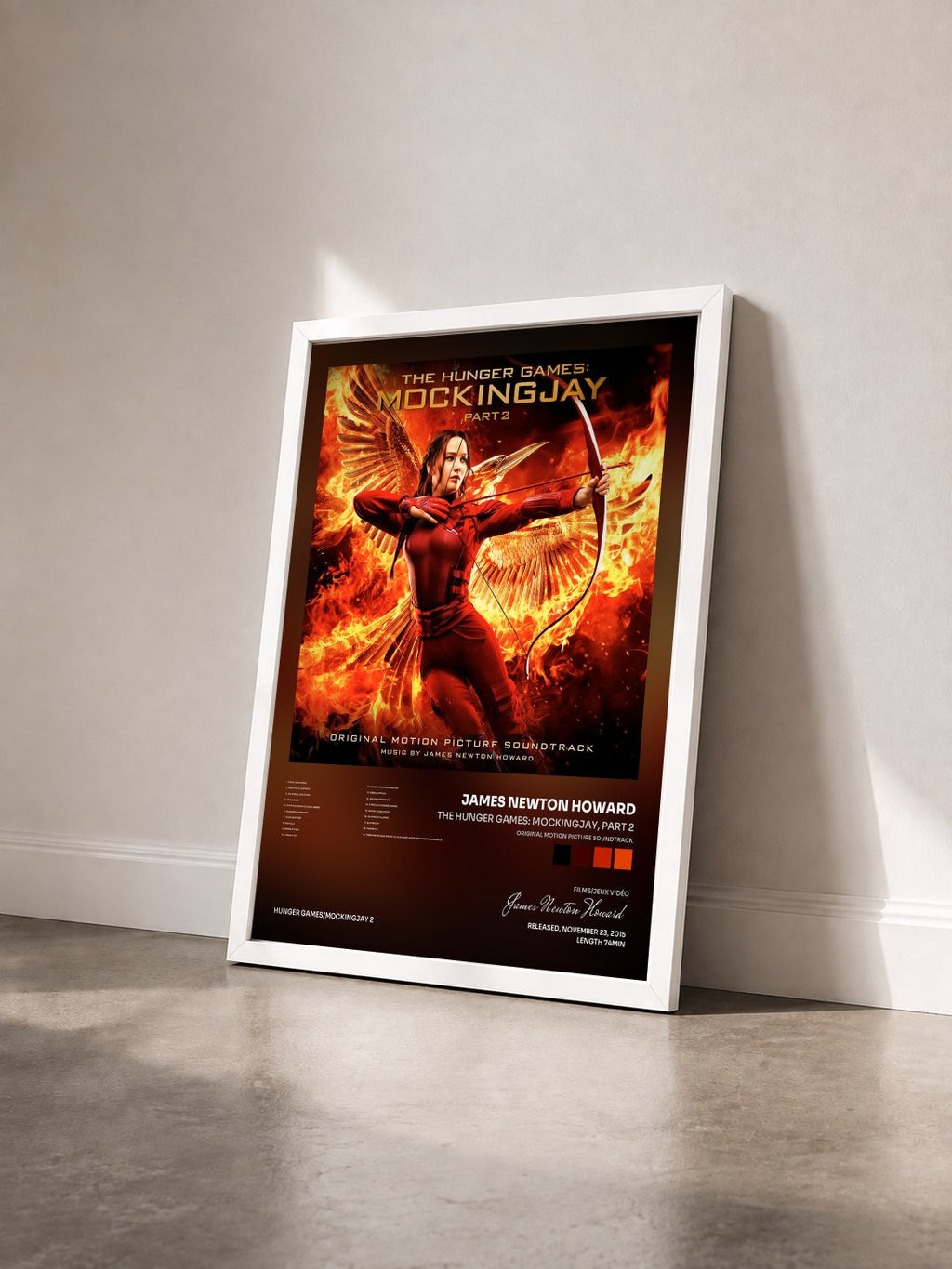#blanc Tableau de l'album The Hunger Games: Mockingjay, Part 2 (Original Motion Picture Soundtrack) de James Newton Howard vu de trois quarts, cadre blanc