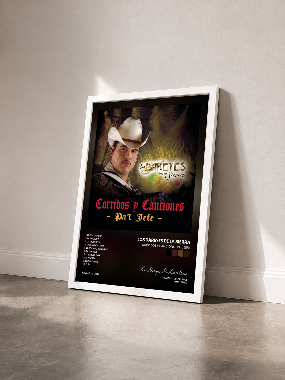 #blanc Tableau de l'album Corridos Y Canciones Pa'l Jefe de Los Dareyes De La Sierra vu de trois quarts, cadre blanc