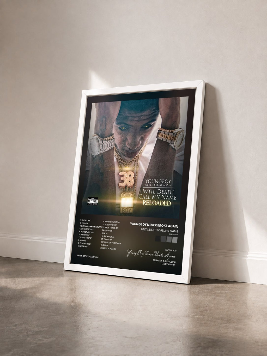 #blanc Tableau de l'album Until Death Call My Name (Reloaded) de YoungBoy Never Broke Again vu de trois quarts, cadre blanc