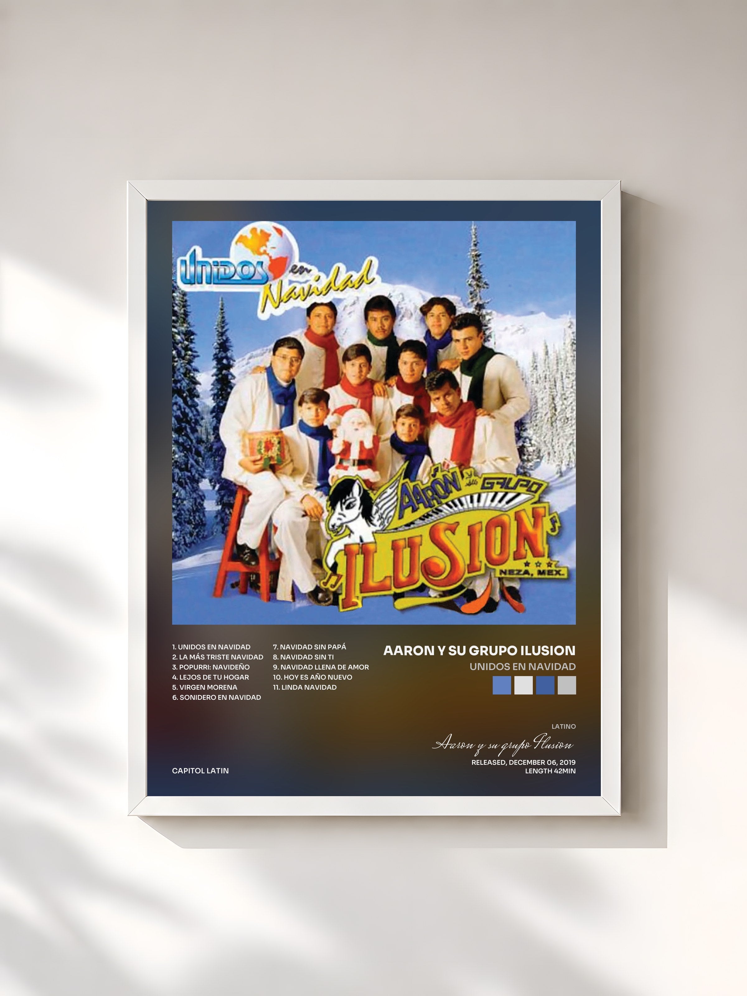 #blanc Tableau de l'album Unidos En Navidad de Aaron y su grupo Ilusion, cadre blanc, imprimé et encadré en France