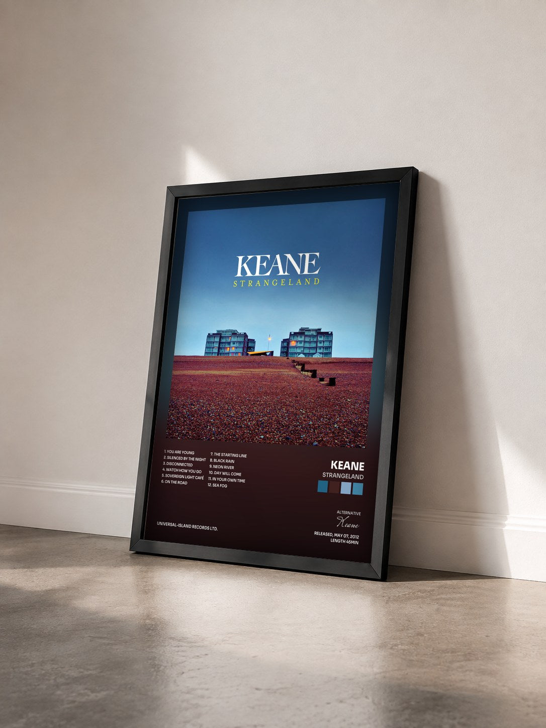 #noir Tableau de l'album Strangeland de Keane vu de trois quarts, cadre noir
