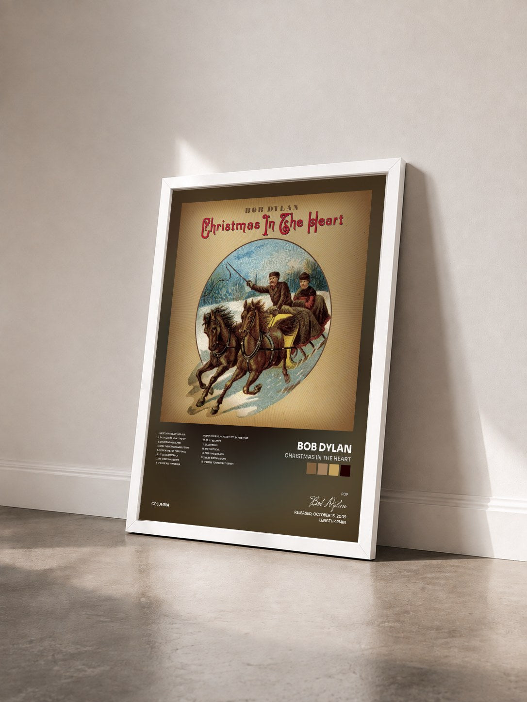 #blanc Tableau de l'album Christmas In The Heart de Bob Dylan vu de trois quarts, cadre blanc