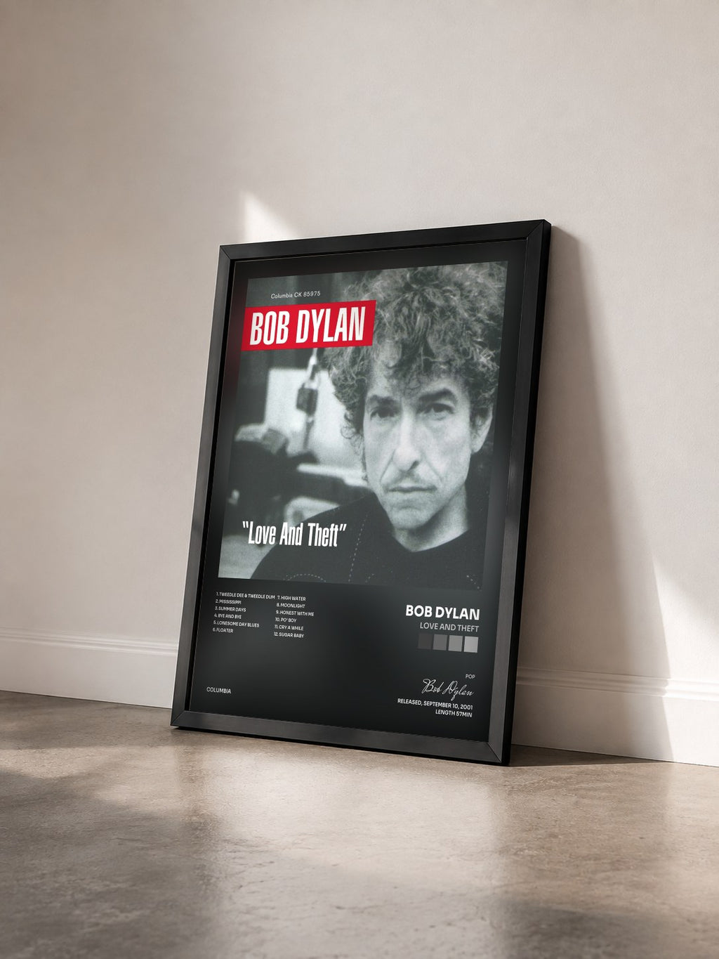 #noir Tableau de l'album Love And Theft de Bob Dylan vu de trois quarts, cadre noir