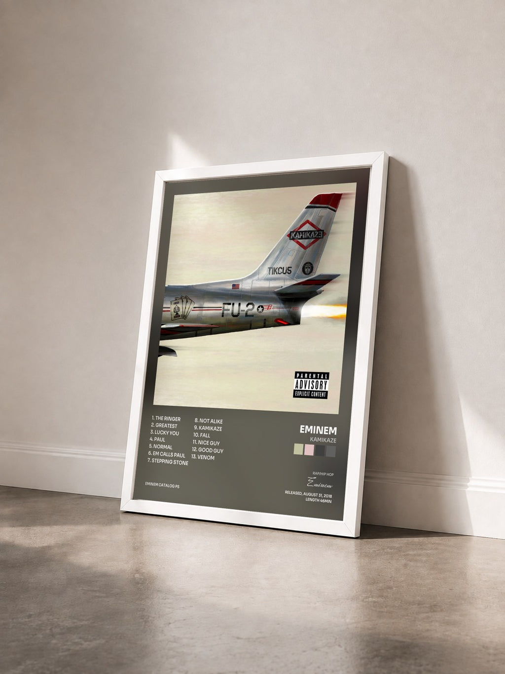 #blanc Tableau de l'album Kamikaze de Eminem vu de trois quarts, cadre blanc