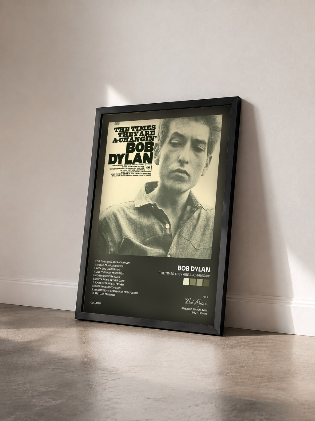 #noir The Times They Are A-Changin' by Bob Dylan as a framed art print seen at an angle, black frame
