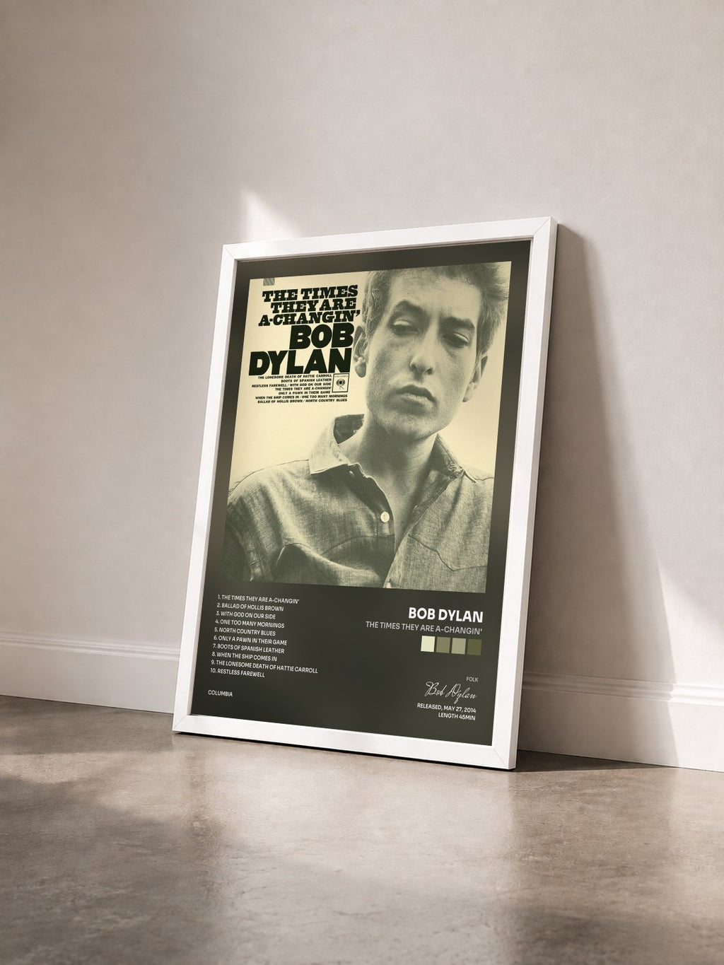 #blanc The Times They Are A-Changin' by Bob Dylan as a framed art print seen at an angle, white frame