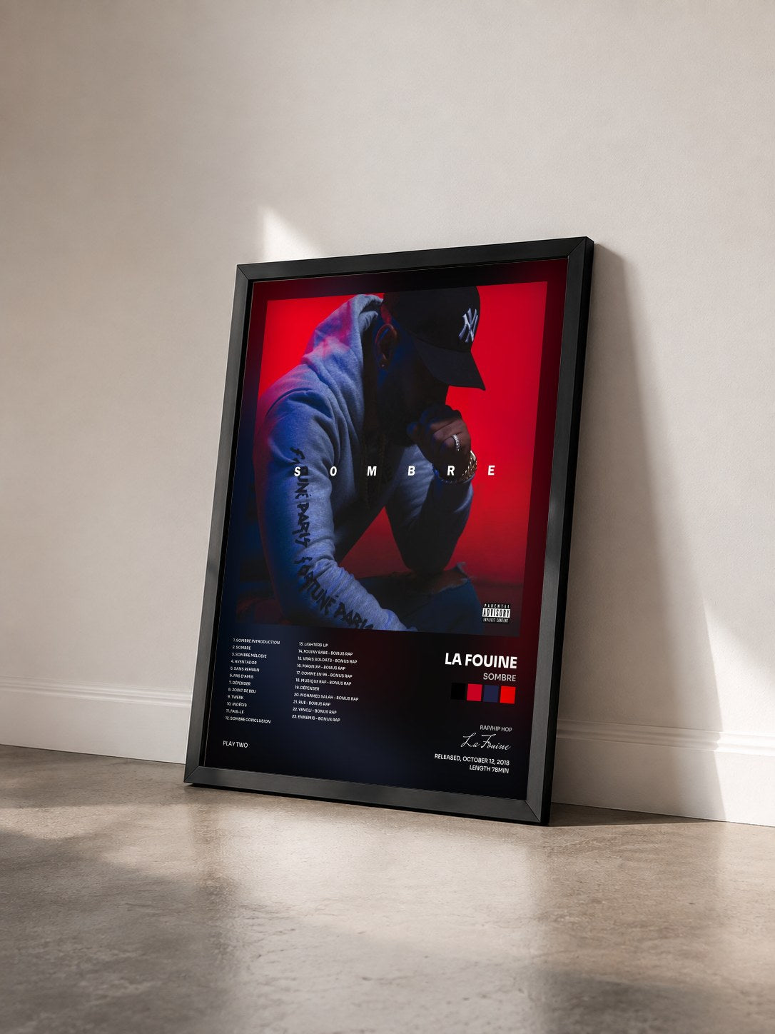 #noir Tableau de l'album Sombre de La Fouine vu de trois quarts, cadre noir
