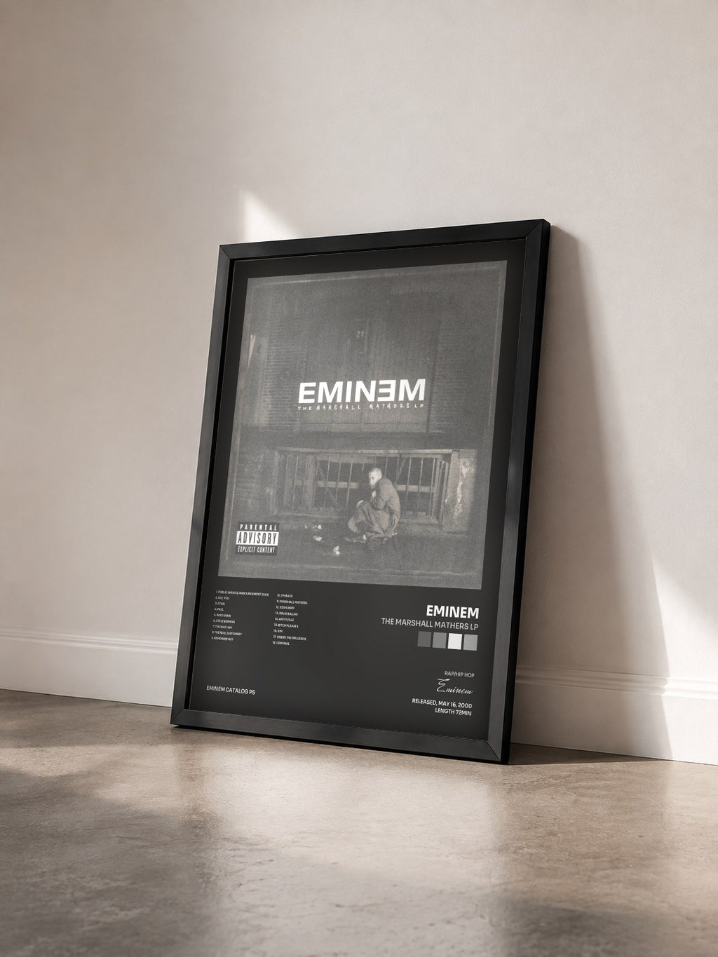 #noir Tableau de l'album The Marshall Mathers LP de Eminem vu de trois quarts, cadre noir