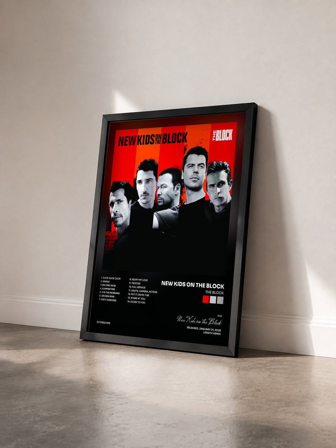#noir Tableau de l'album The Block de New Kids on the Block vu de trois quarts, cadre noir