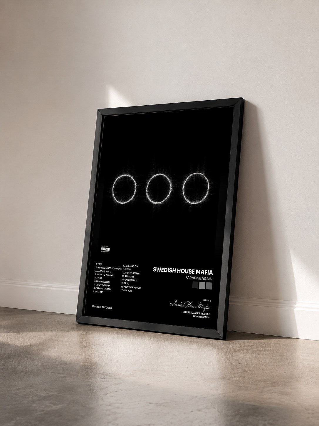 #noir Tableau de l'album Paradise Again de Swedish House Mafia vu de trois quarts, cadre noir