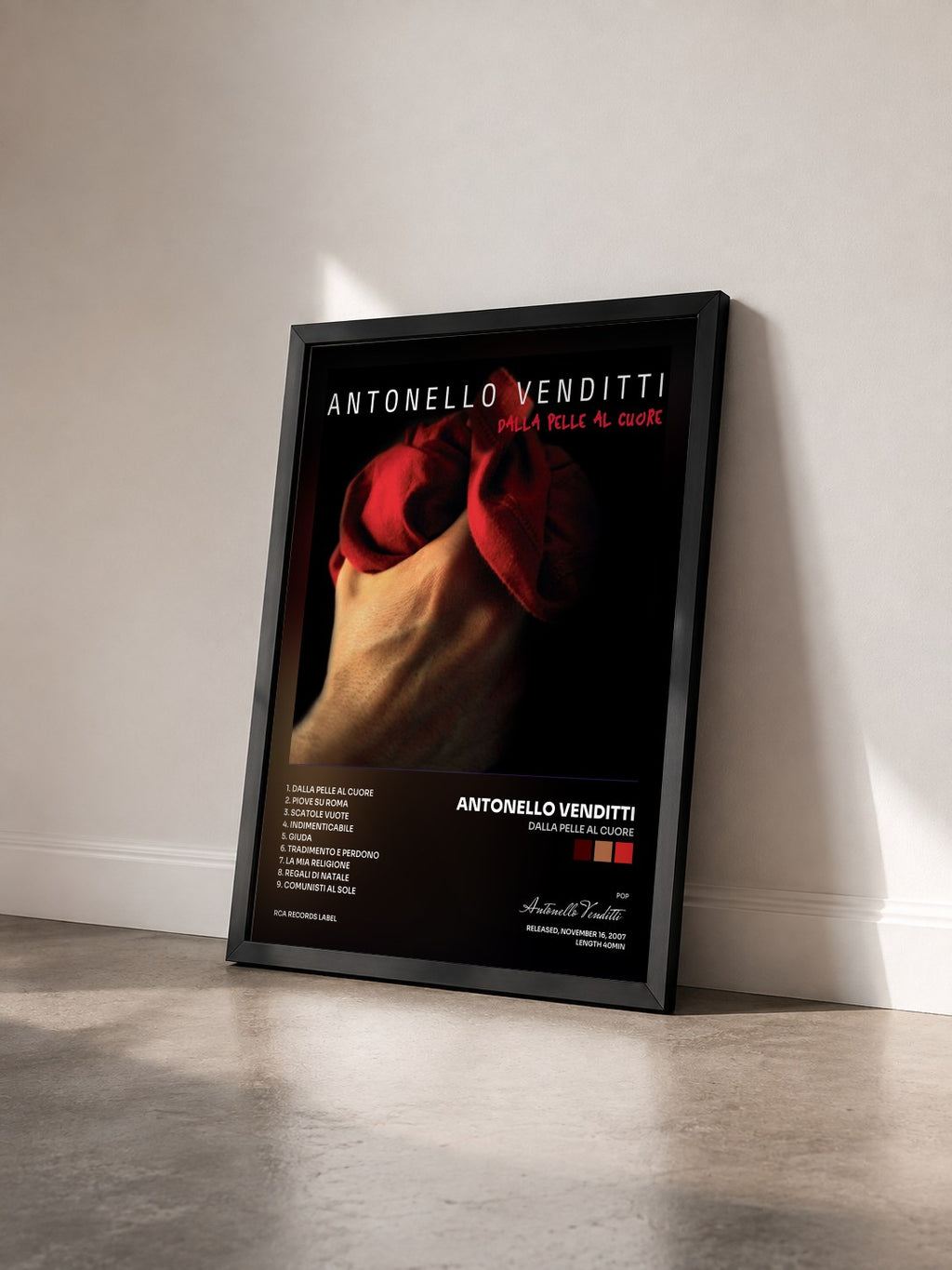 #noir Tableau de l'album Dalla pelle al cuore de Antonello Venditti vu de trois quarts, cadre noir