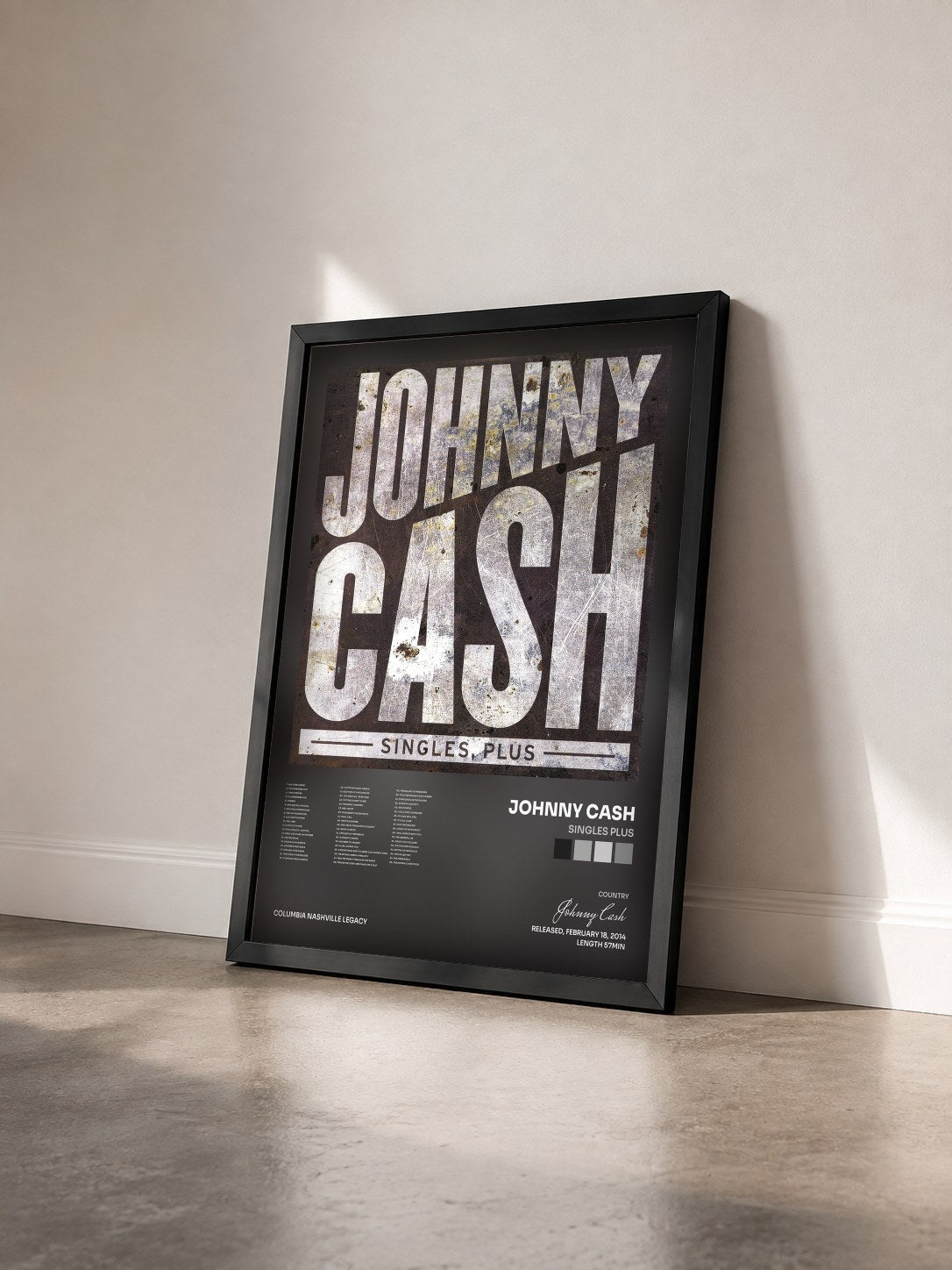 #noir Tableau de l'album Singles Plus de Johnny Cash vu de trois quarts, cadre noir