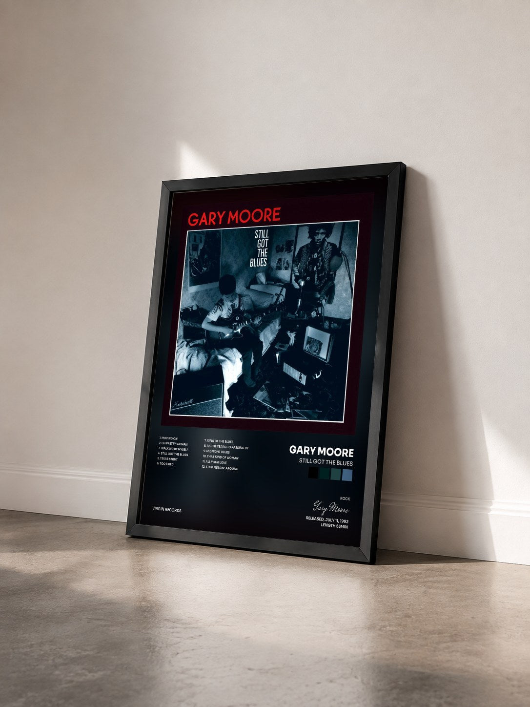#noir Still Got The Blues by Gary Moore as a framed art print seen at an angle, black frame