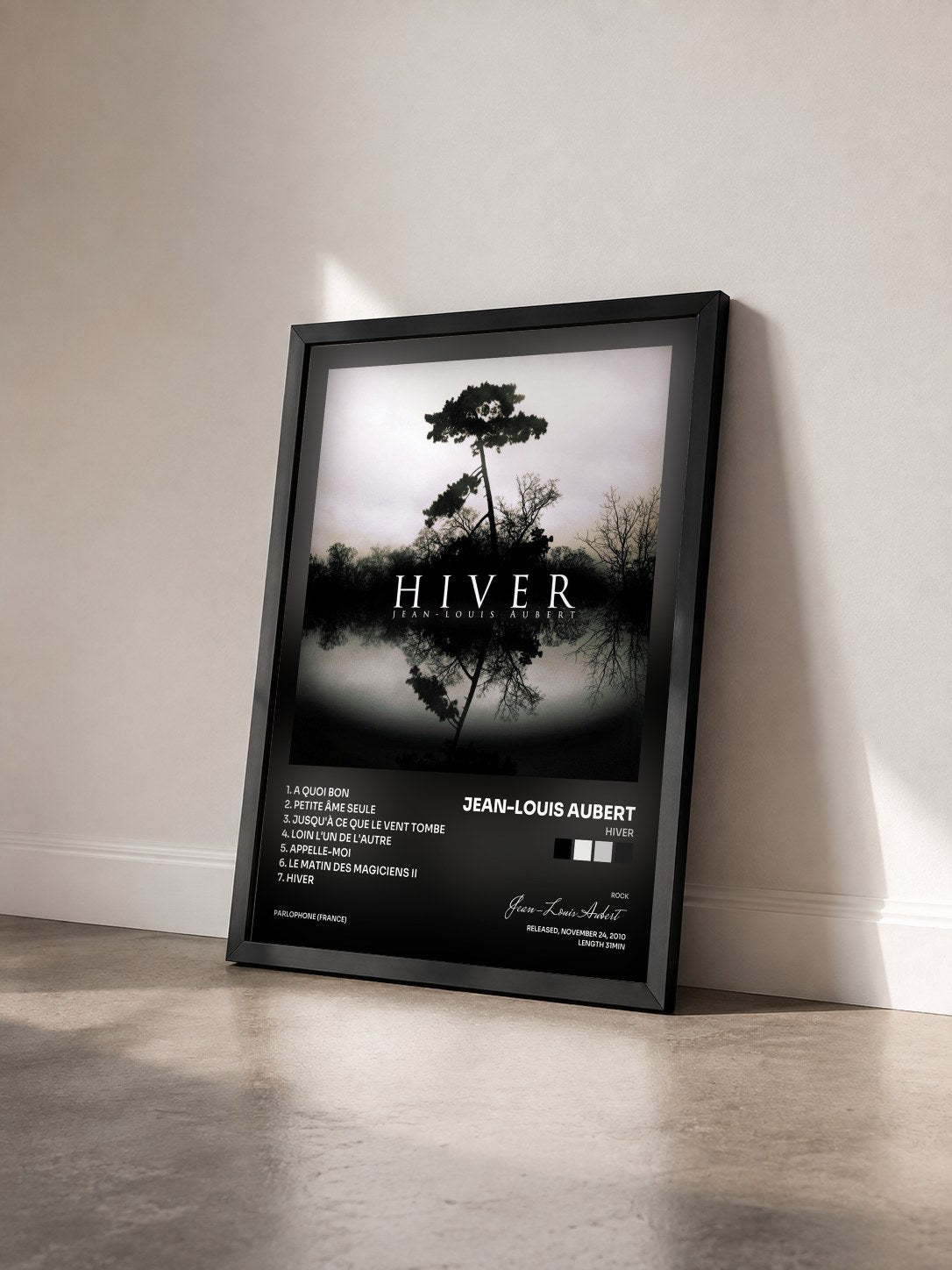 #noir Hiver by Jean-Louis Aubert as a framed art print seen at an angle, black frame