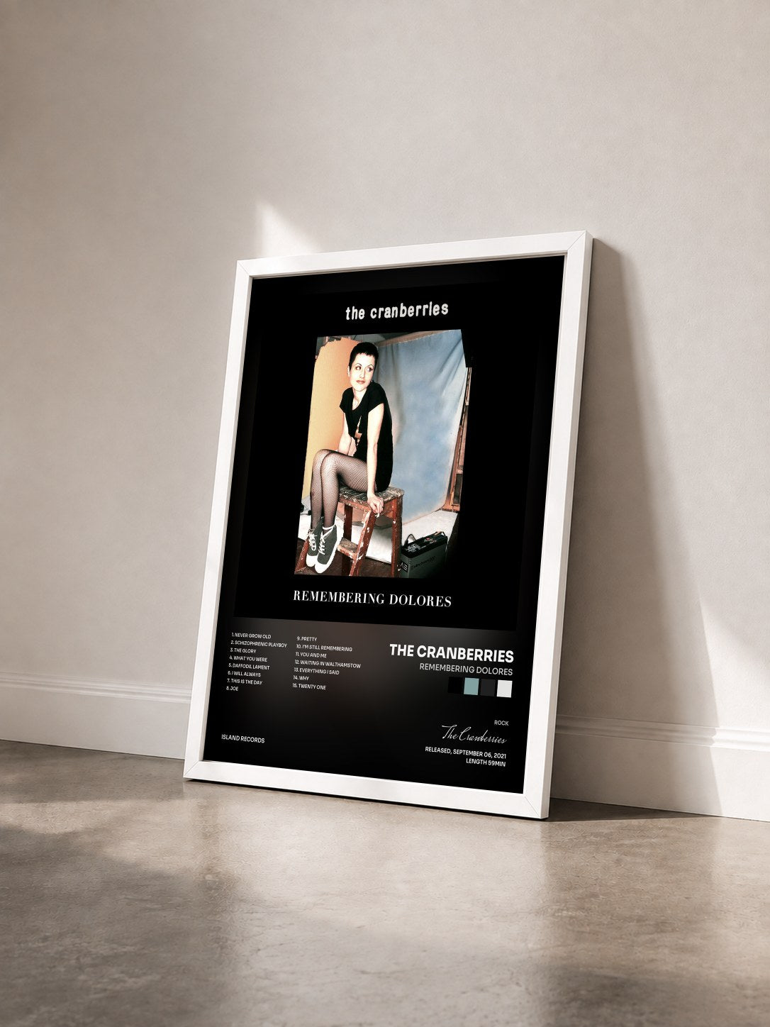 #blanc Remembering Dolores by The Cranberries as a framed art print seen at an angle, white frame