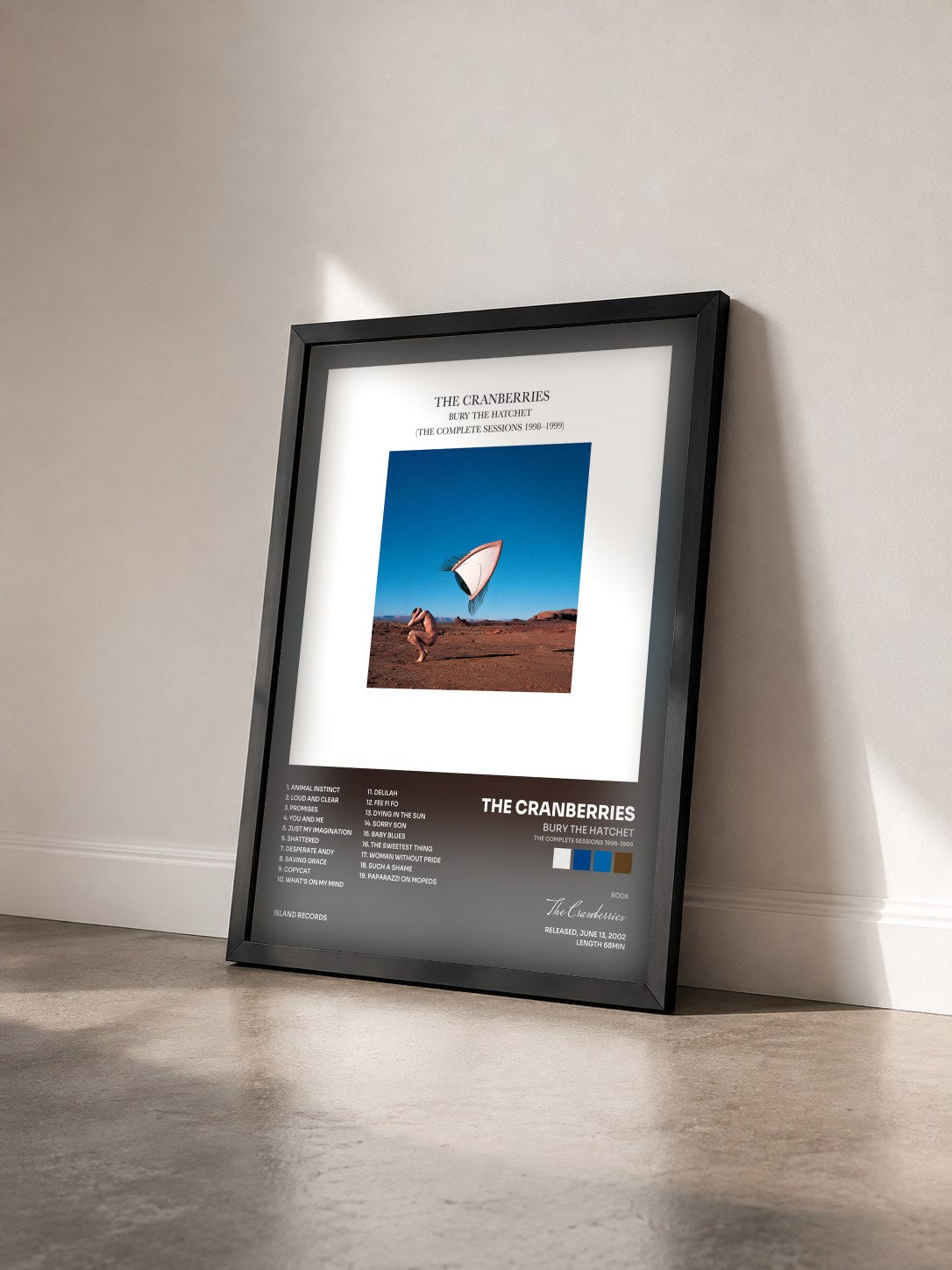 #noir Bury The Hatchet (The Complete Sessions 1998-1999) by The Cranberries as a framed art print seen at an angle, black frame