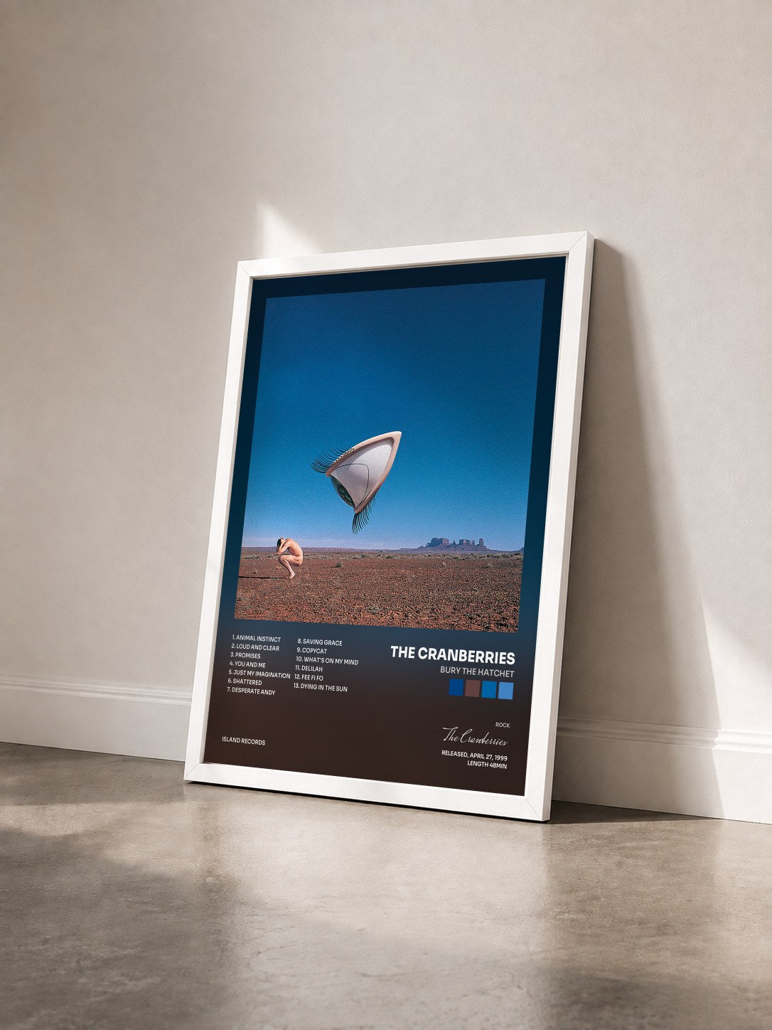 #blanc Bury The Hatchet by The Cranberries as a framed art print seen at an angle, white frame