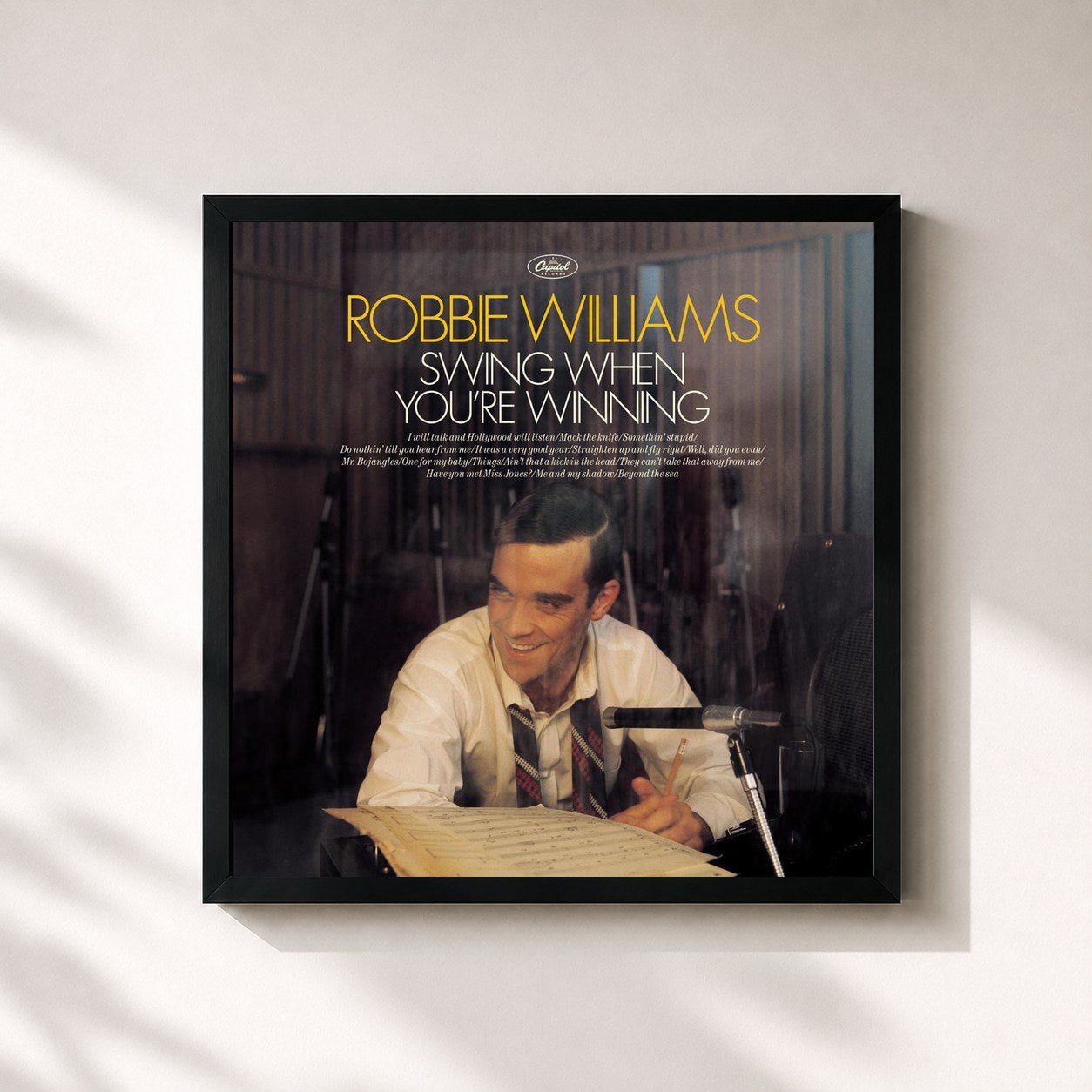 #noir Swing When You're Winning by Robbie Williams as a square framed art print, black 32x32 cm frame