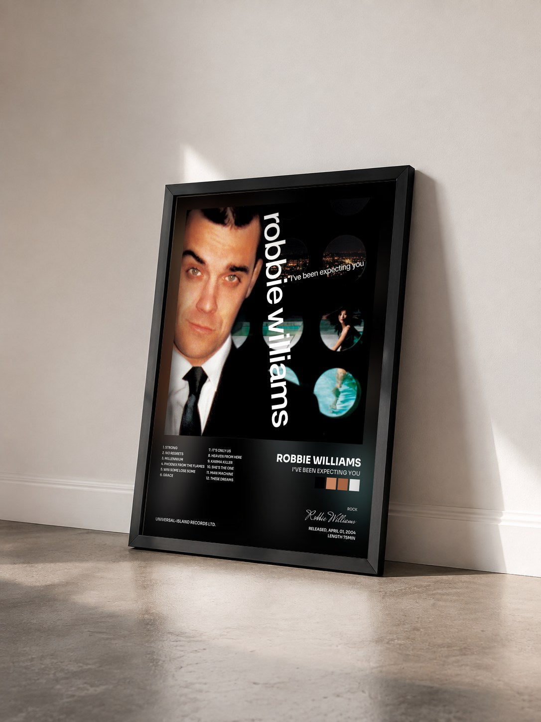 #noir Tableau de l'album I've Been Expecting You de Robbie Williams vu de trois quarts, cadre noir