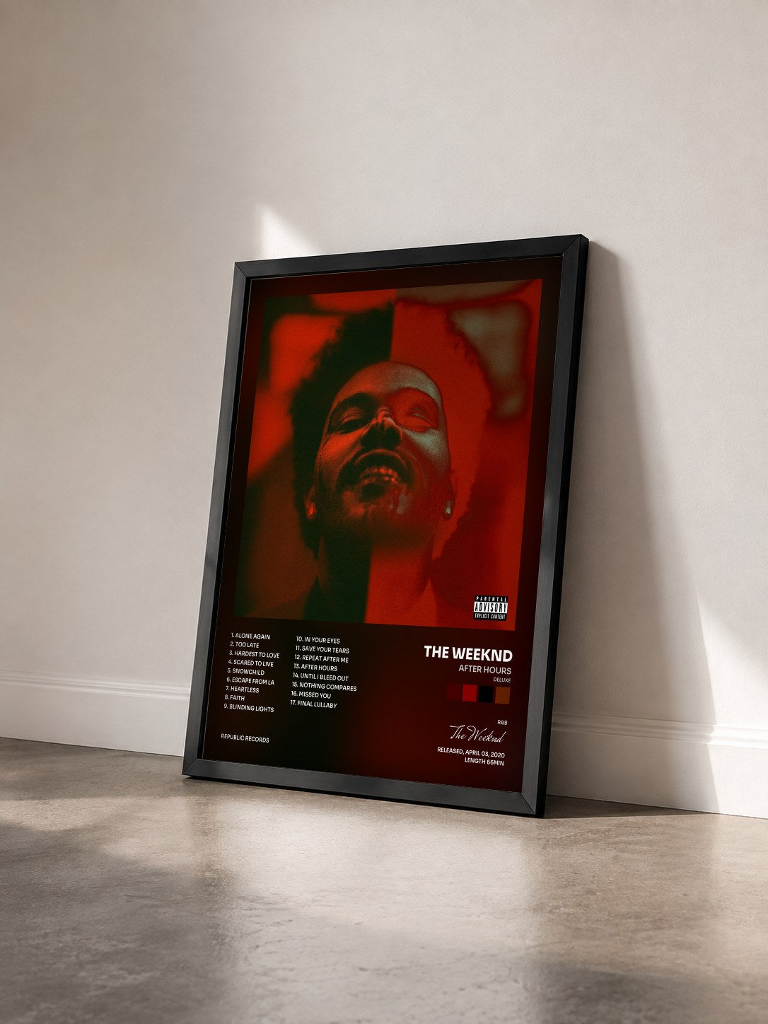 #noir Tableau de l'album After Hours (Deluxe) de The Weeknd vu de trois quarts, cadre noir