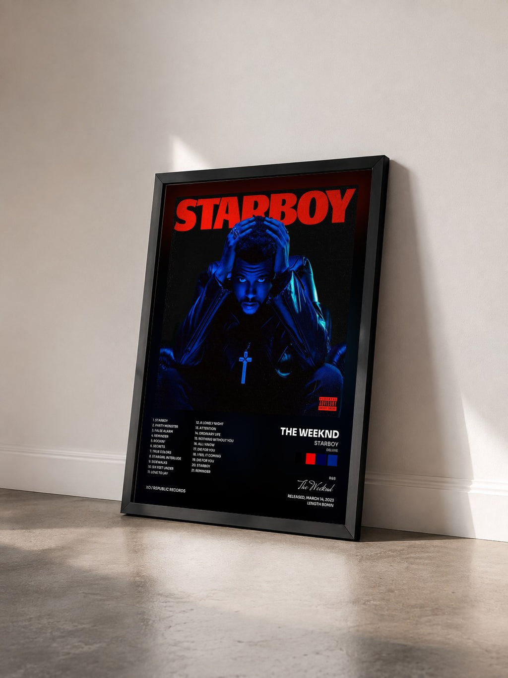 #noir Tableau de l'album Starboy (Deluxe) de The Weeknd vu de trois quarts, cadre noir