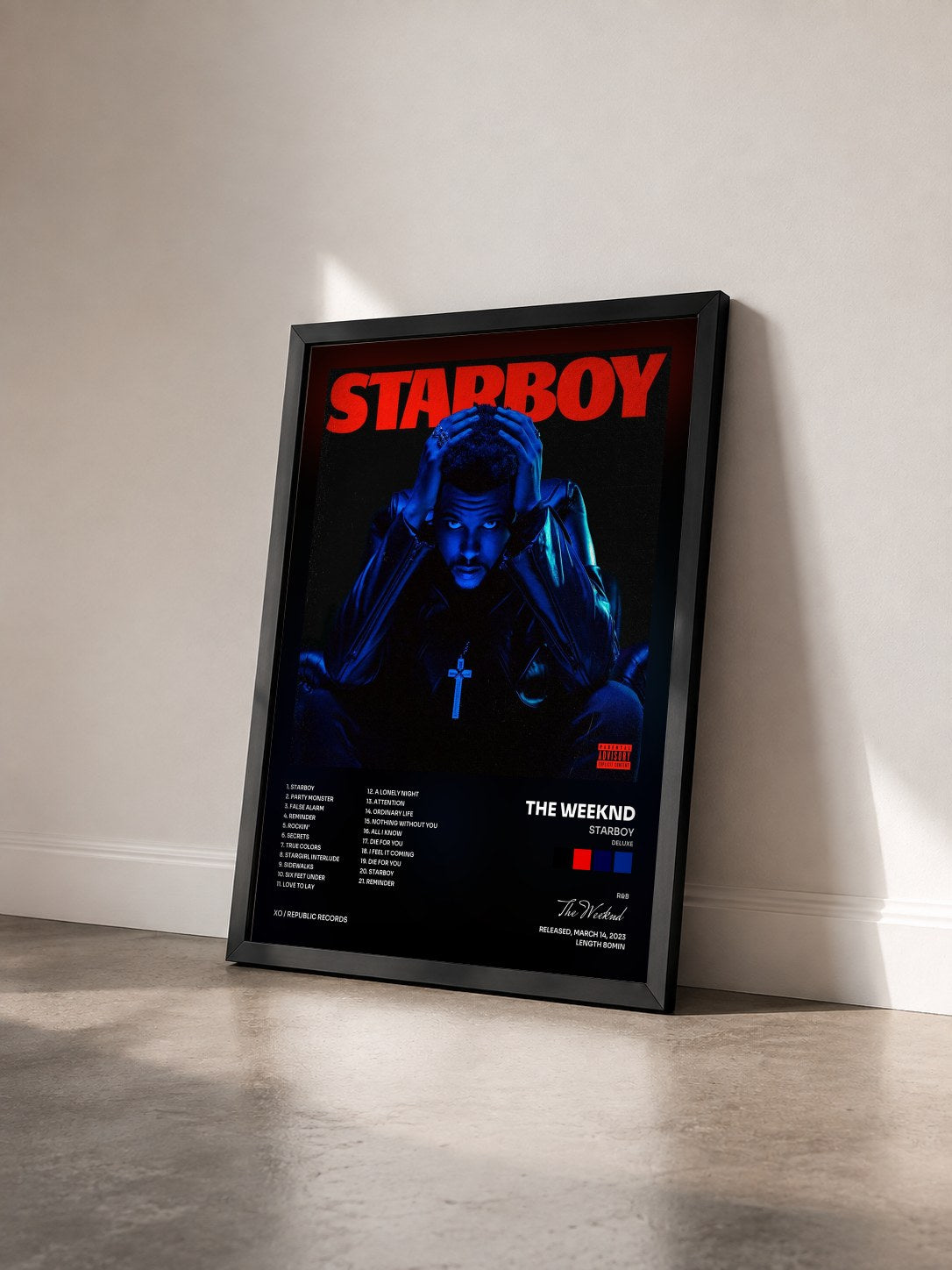 #noir Tableau de l'album Starboy (Deluxe) de The Weeknd vu de trois quarts, cadre noir