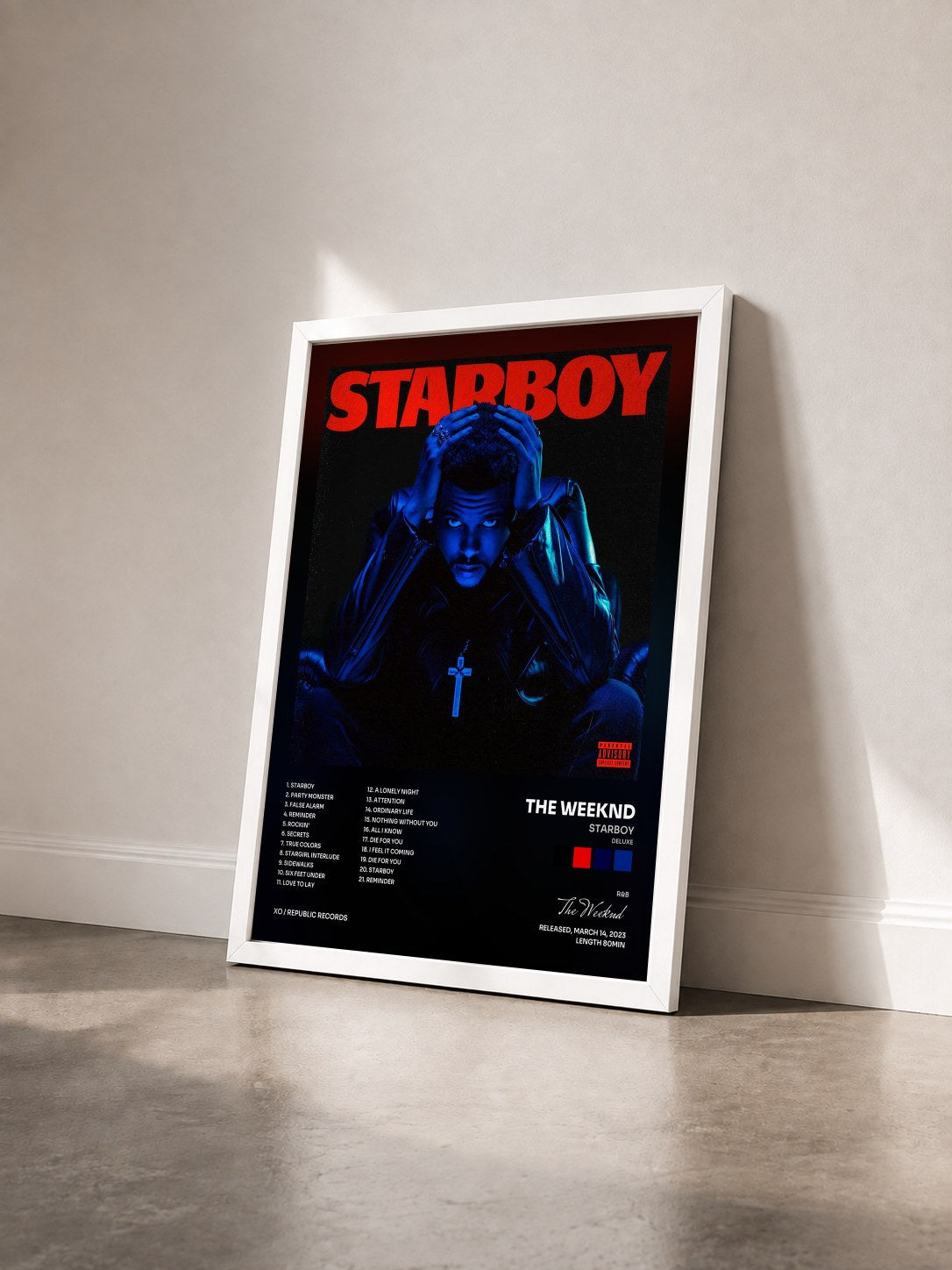 #blanc Tableau de l'album Starboy (Deluxe) de The Weeknd vu de trois quarts, cadre blanc