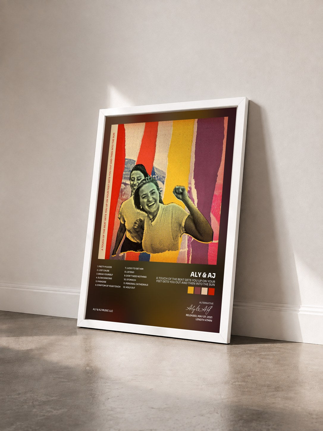 #blanc Tableau de l'album a touch of the beat gets you up on your feet gets you out and then into the sun de Aly & AJ vu de trois quarts, cadre blanc