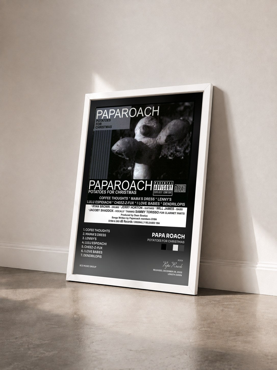 #blanc Tableau de l'album Potatoes For Christmas de Papa Roach vu de trois quarts, cadre blanc