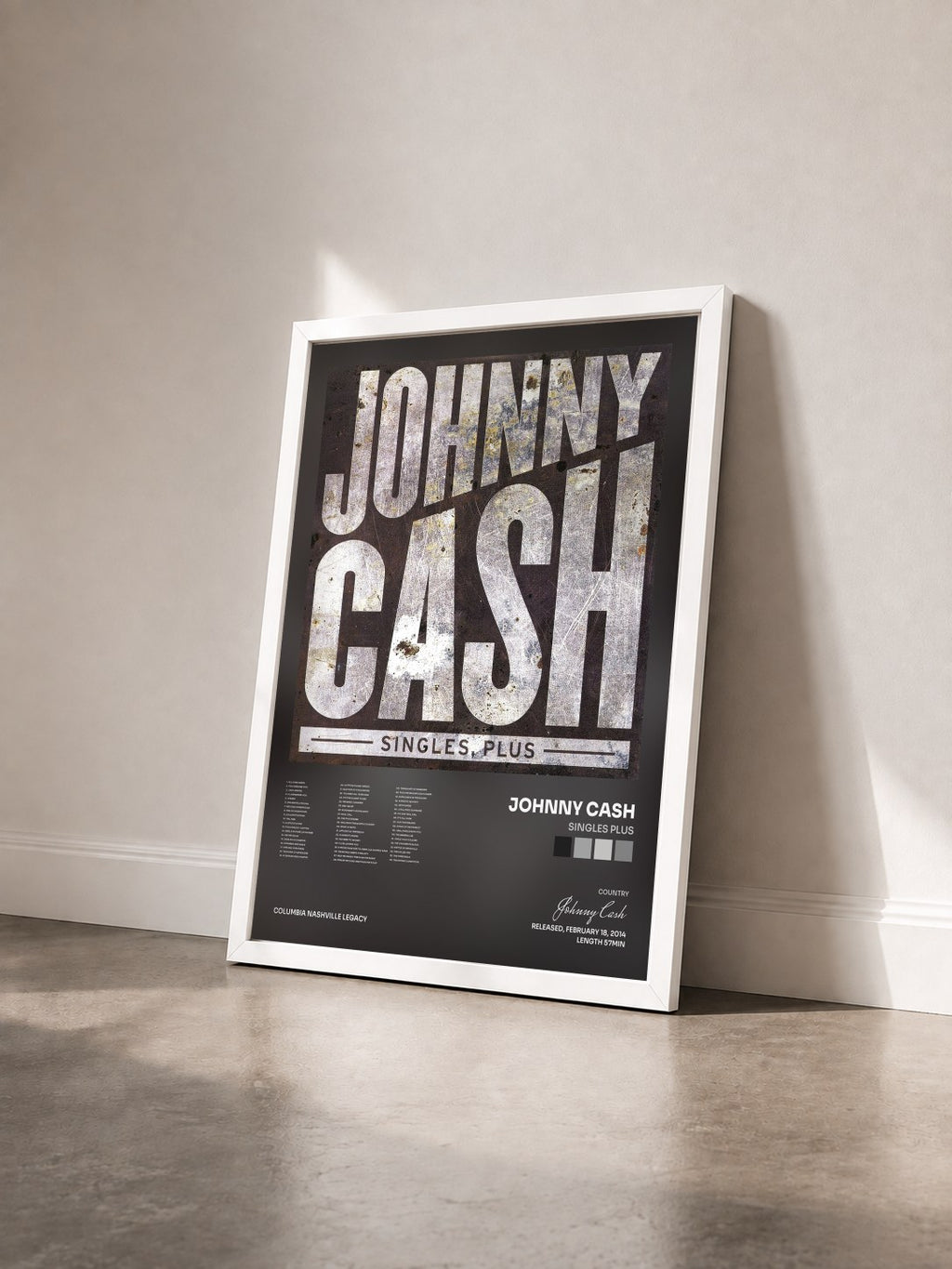 #blanc Tableau de l'album Singles Plus de Johnny Cash vu de trois quarts, cadre blanc